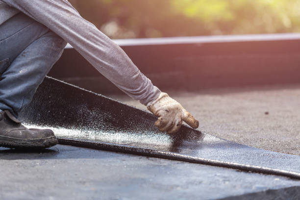 Professional Basement Waterproofing technician working in Winchester, MO